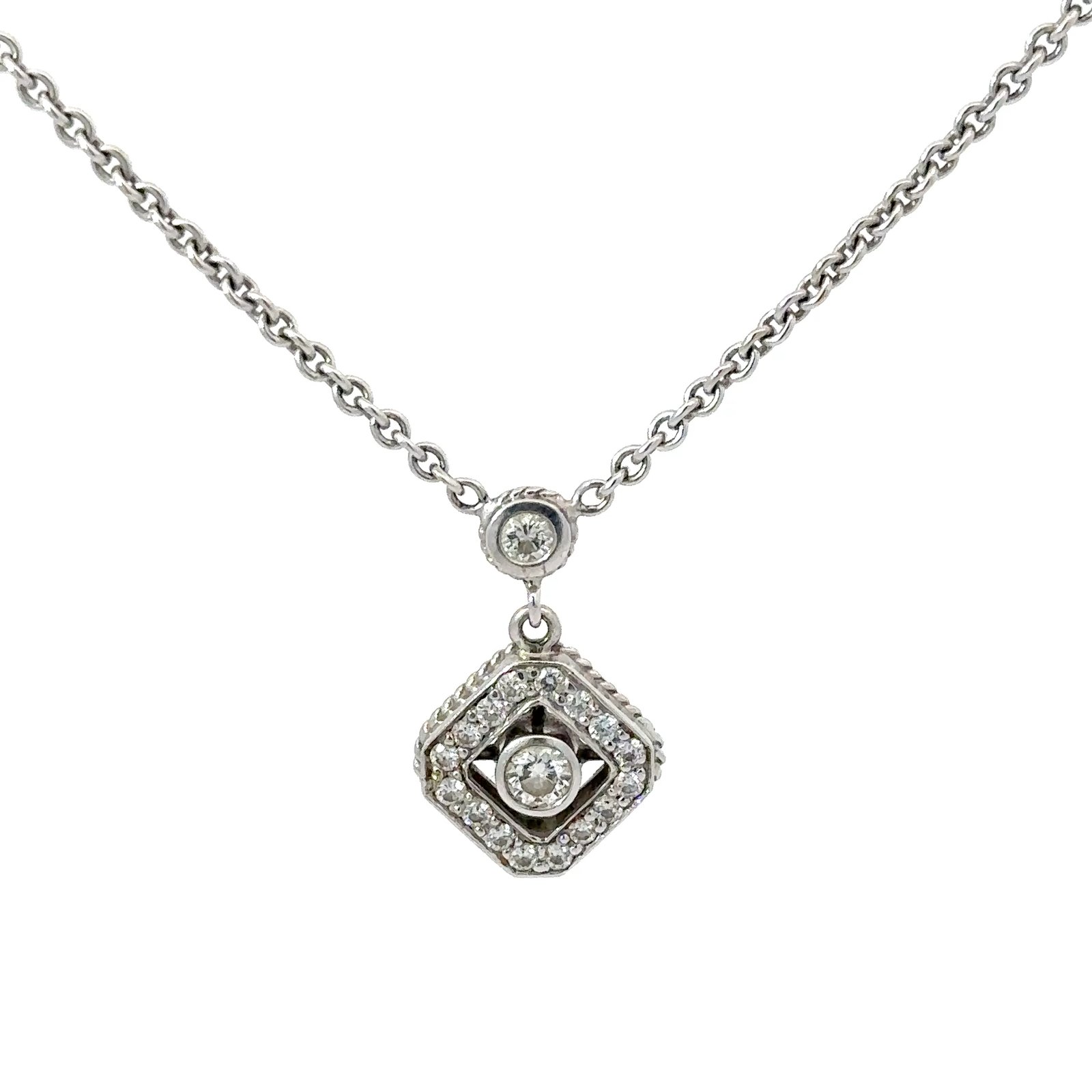 Side-profile view of John's Loan & Jewelry's 18k white gold diamond necklace, showcasing the delicate chain and diamond pavé setting of the pendant.