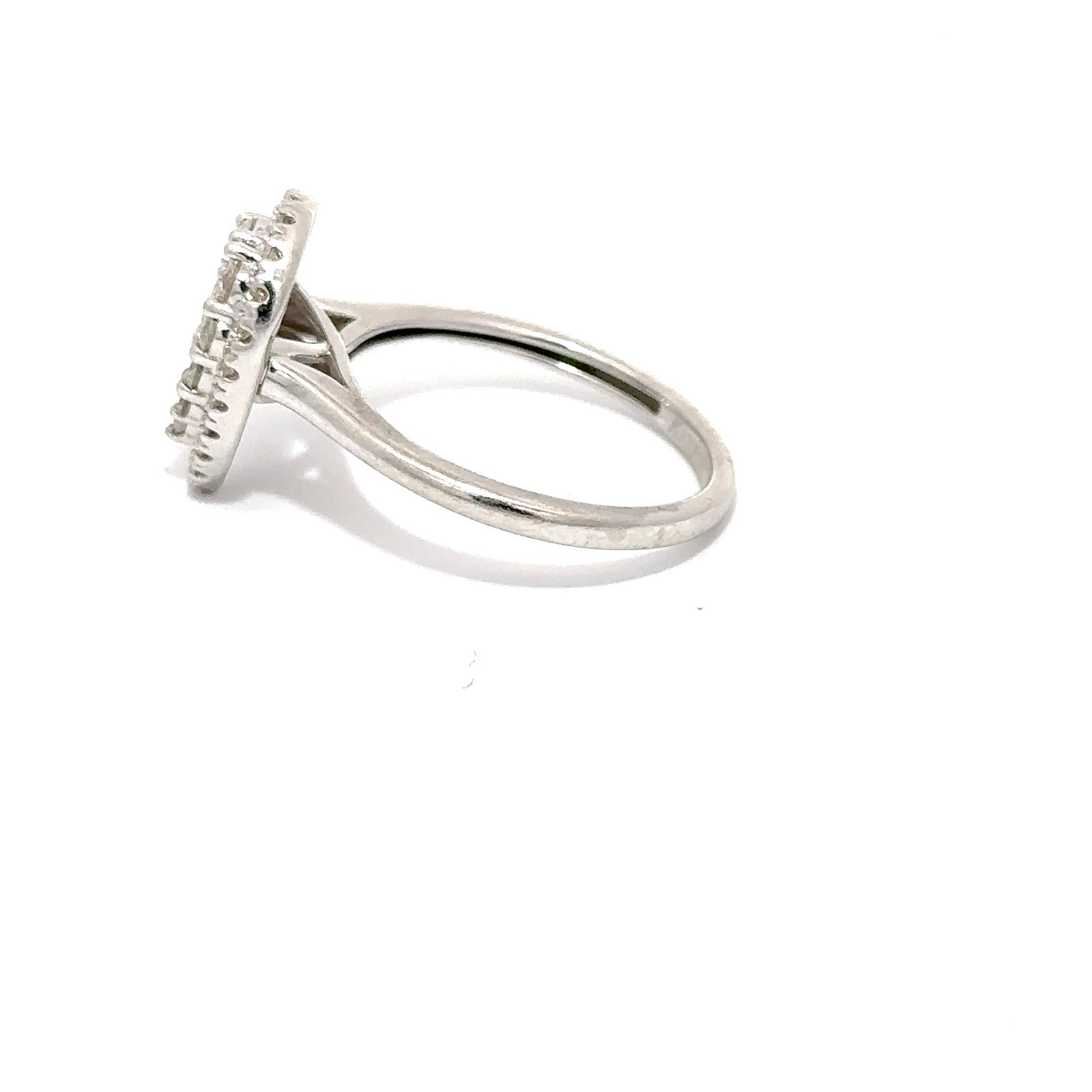 Side-profile view of John's Loan & Jewelry 14k white gold ring showcasing the teardrop diamond cluster setting and smooth, rounded white gold band against a white background.
