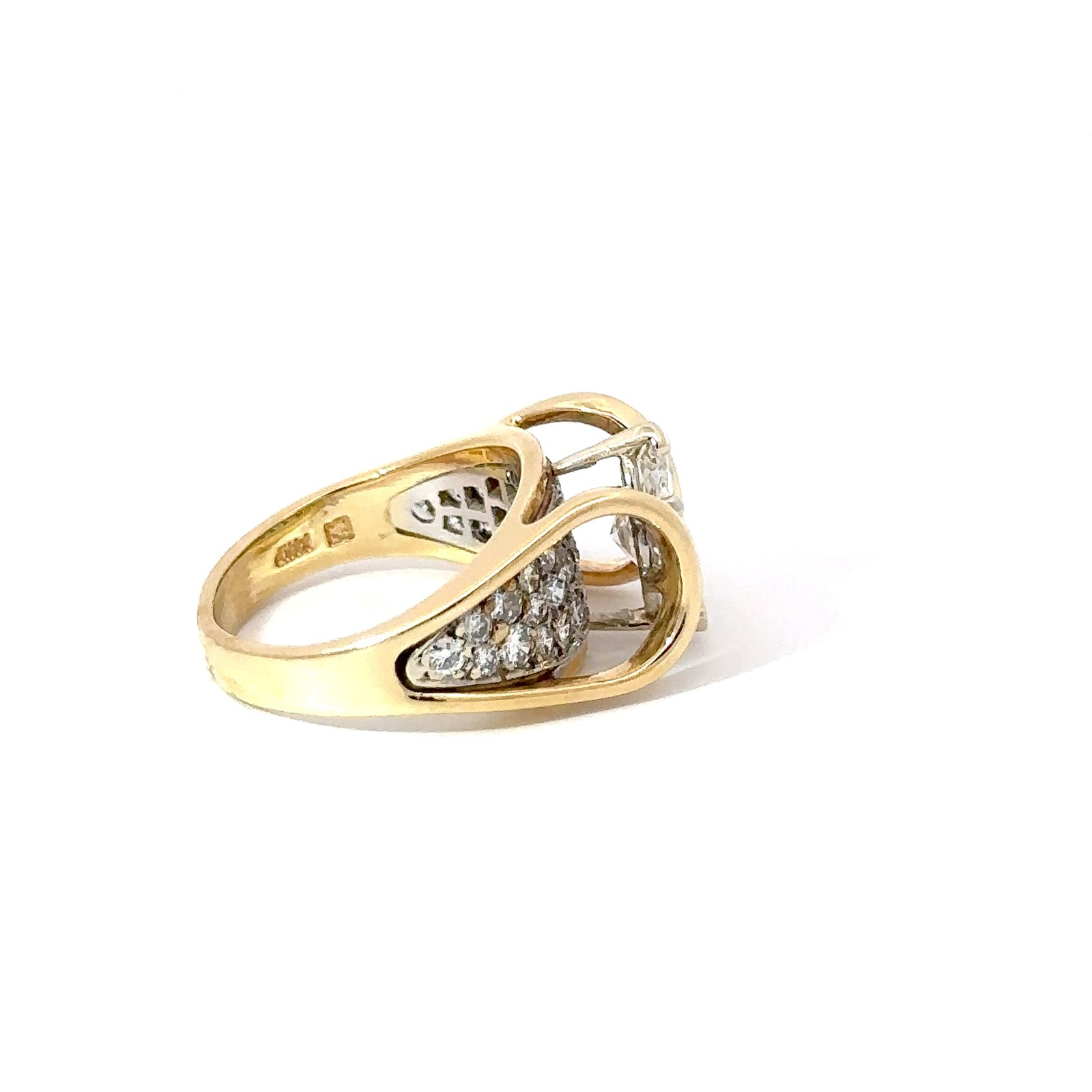 Side-profile view of a 14k yellow gold 'suspension bridge' ring from John's Loan & Jewelry. The marquise diamond is visible, set within the gold jewelry, accented by pave-set diamonds.