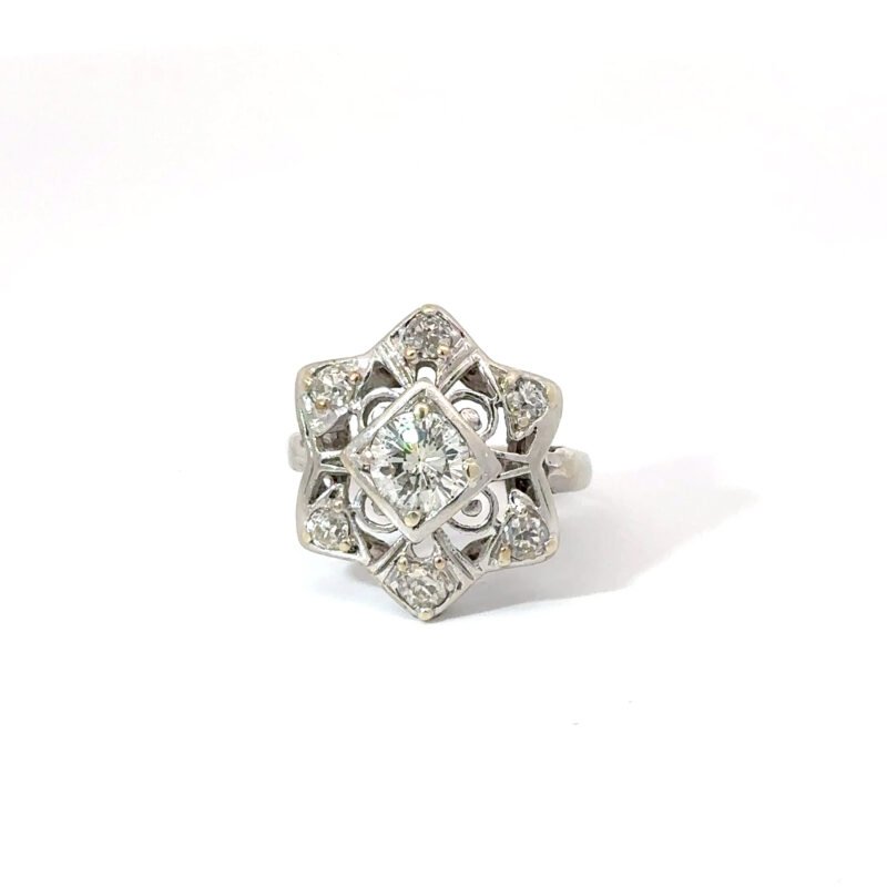 Front-facing studio shot of John's Loan & Jewelry 14k white gold ring. A six-pointed star design features center and accent diamonds in an Art Deco style, set on a white table.