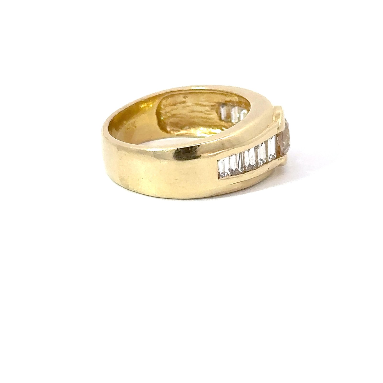 Side-angle shot of a 14k gold and diamond ring for men from John's Loan & Jewelry, highlighting the gold jewelry's construction and diamond placement.