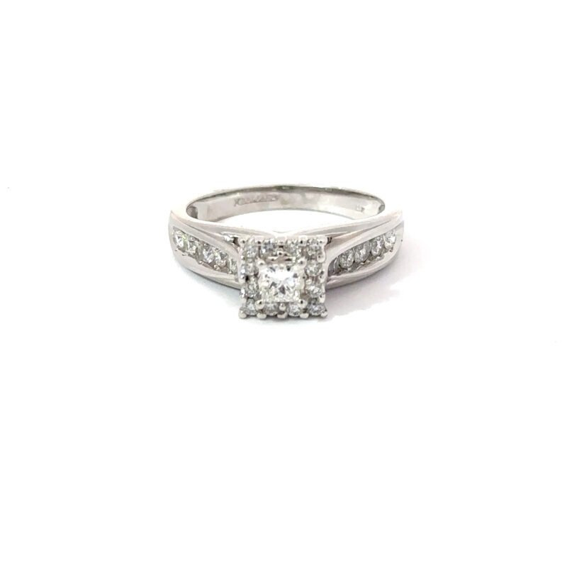 14kt white gold engagement ring featuring a princess-cut diamond center stone with a halo setting, flanked by channel-set diamonds along the ring's table; from John's Loan & Jewelry.